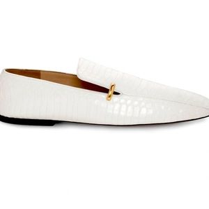 This is your quite luxury moment. ST. JOHN croc embossed optic white loafers.